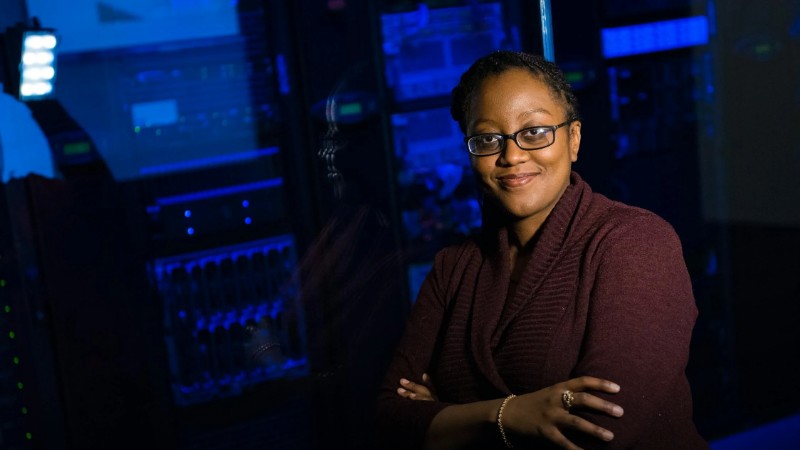 Confident woman in data center, showcasing tech expertise. - pexel